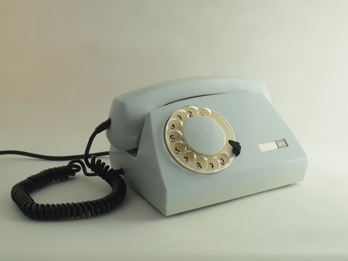 vintage grey rotary telephone