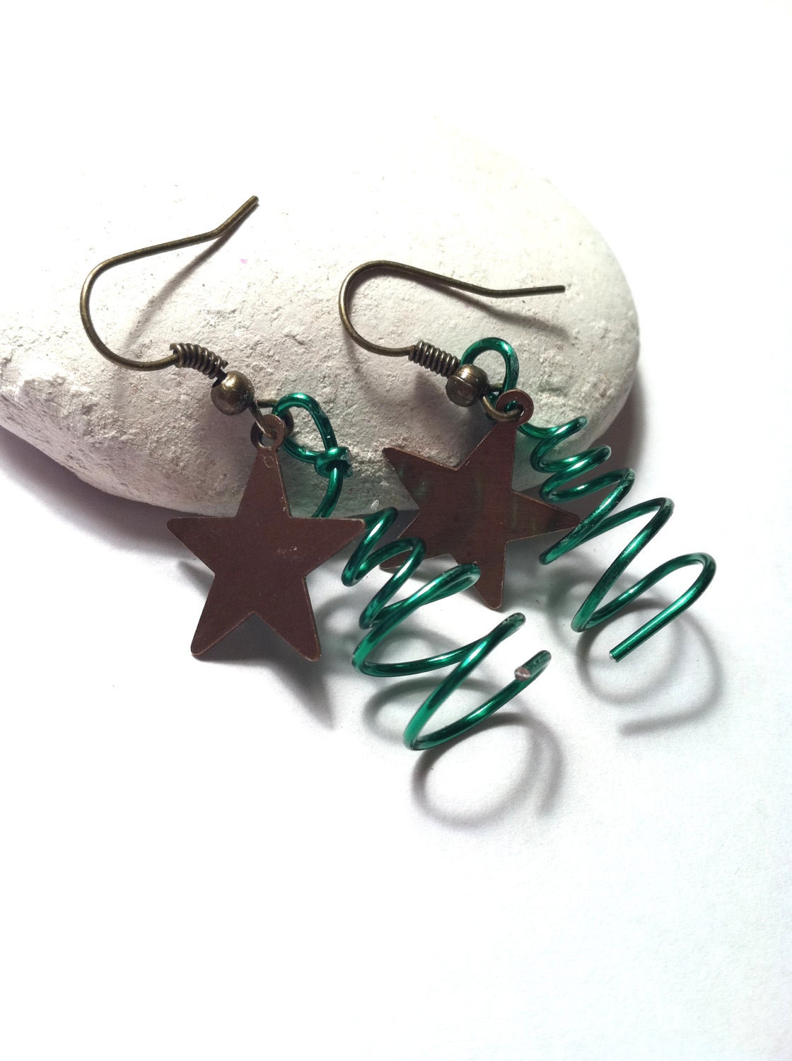 Holiday Wire earrings adorned with brass stars