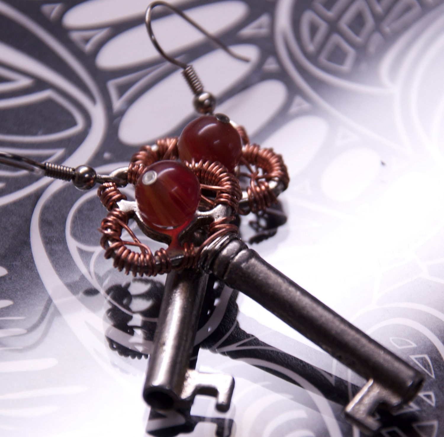vintage skeleton key earrings, copper enhancements  and a rose quartz bead.