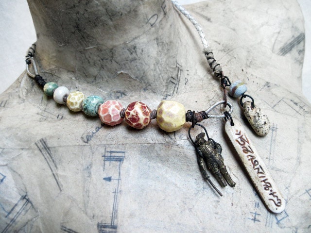 Om Mani Padme Hum. Faceted Ceramic Art Bead Choker in Tribal Pastels.