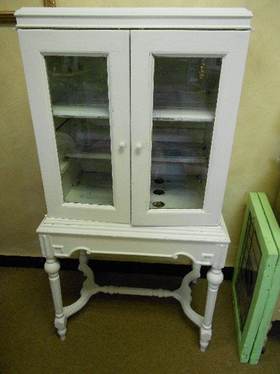 Small Cabinet with 2 Glass Doors- Not Too Shabby