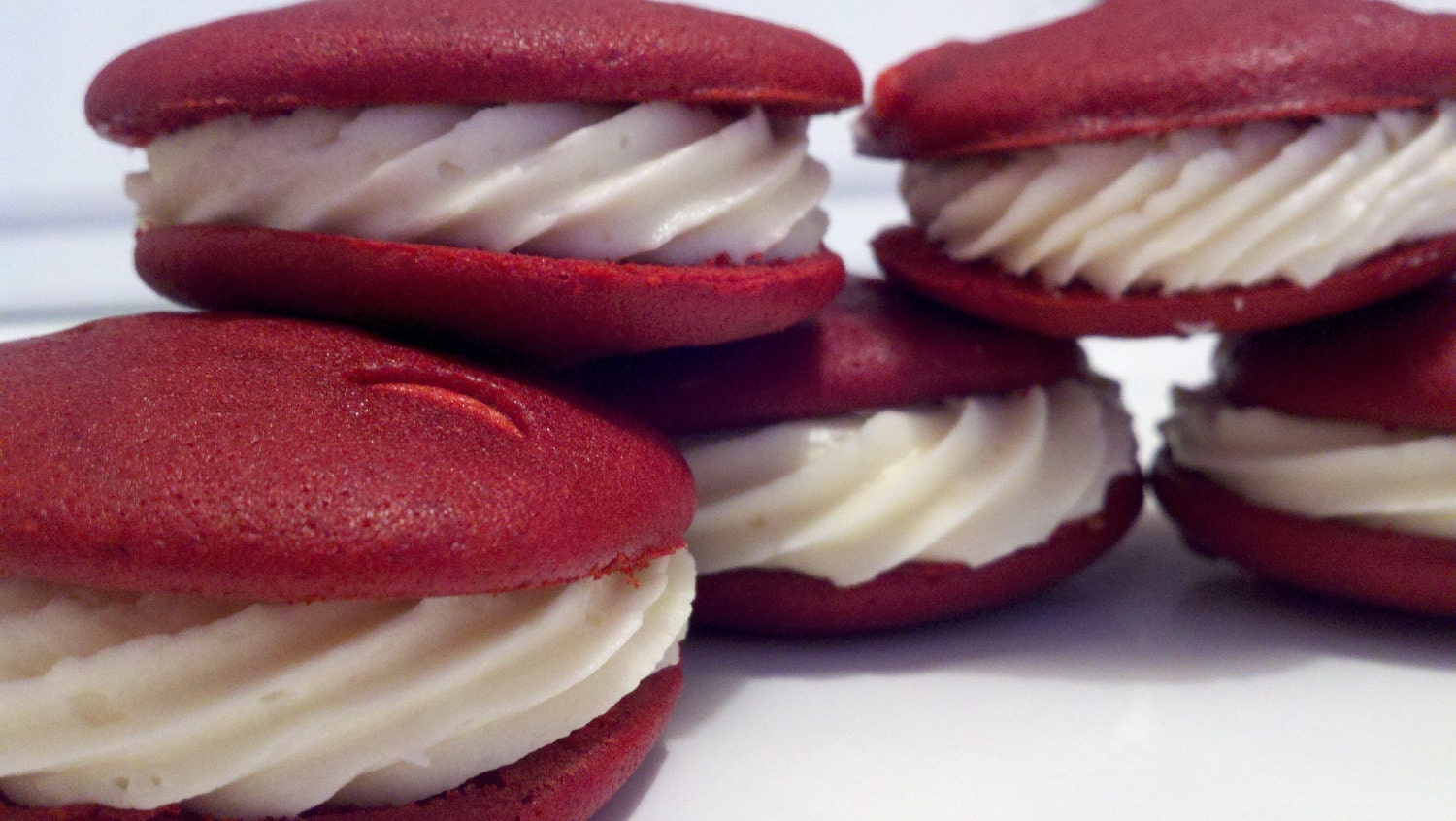 Red Velvet Cupcake top sandwiches with creamed cheese frosting filling. Think Valentine's Day.