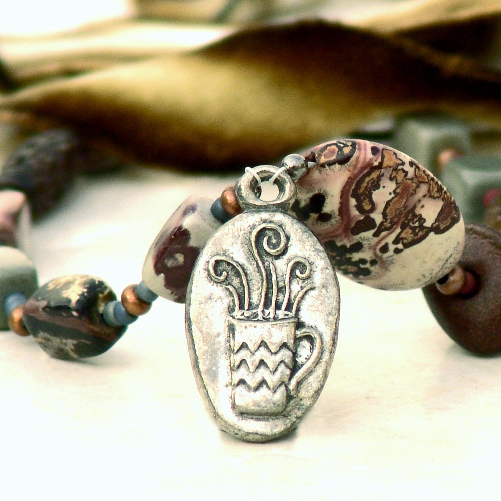 Chunky Ribbon And Chain Beaded Pendant by galleryzooartdesigns on Etsy from etsy.com