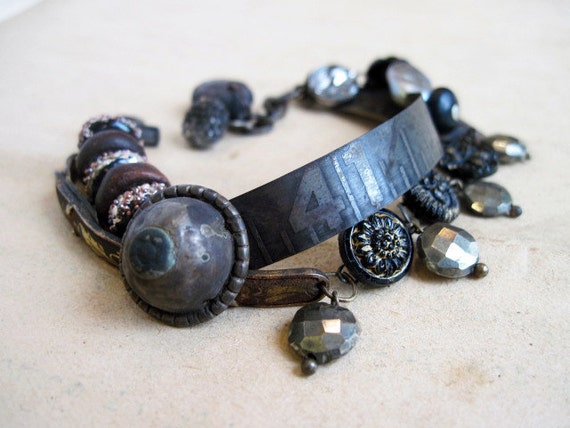 War Madrigals.  Rustic Assemblage Bracelet with Etched Ruler and Damascene.