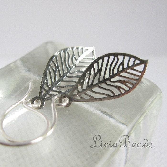 Disintegrate - silver veined leaf earrings