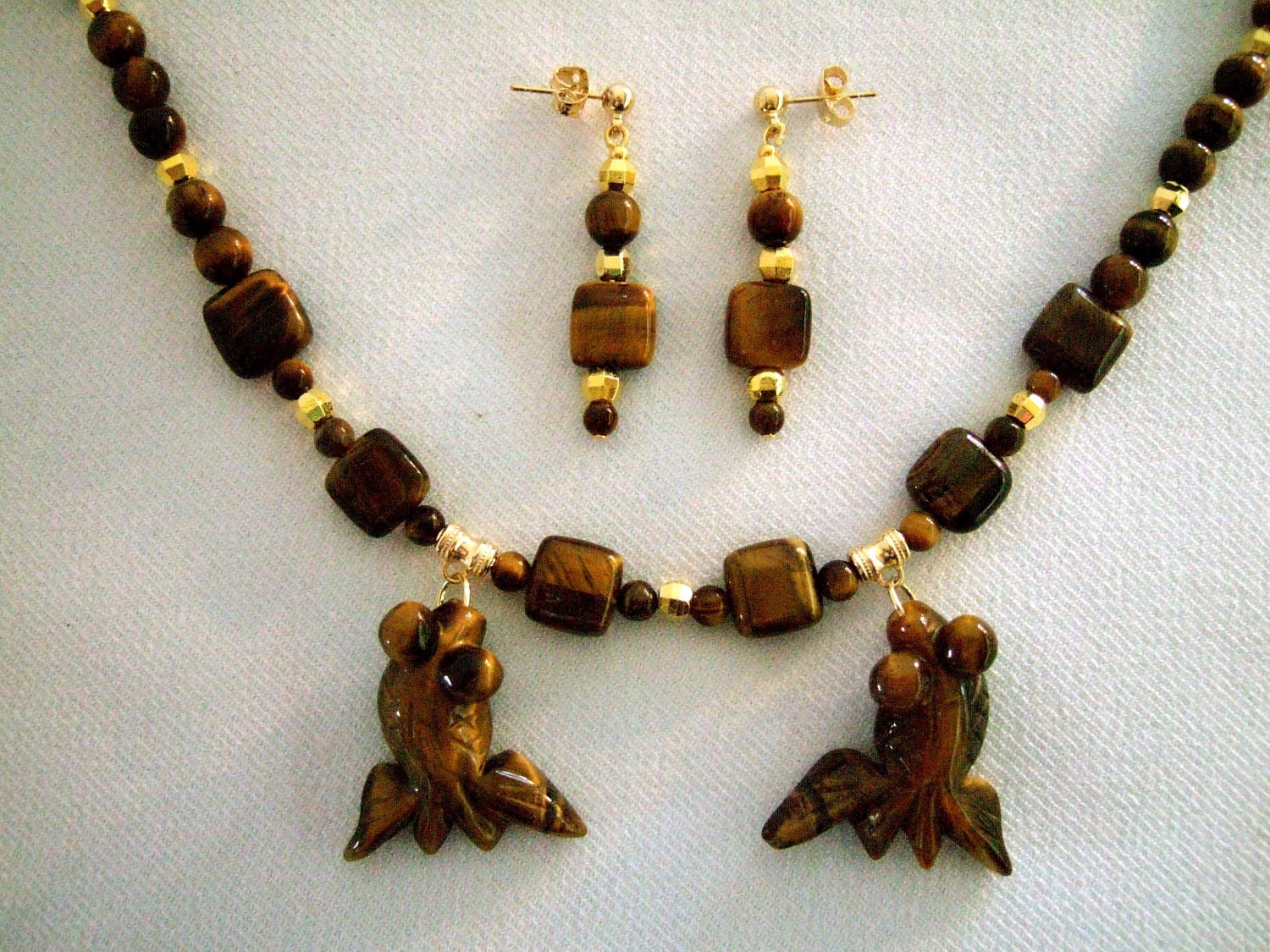 Tigereye stone hand beaded gold fish necklace and by JewelrybyIshi from etsy.com