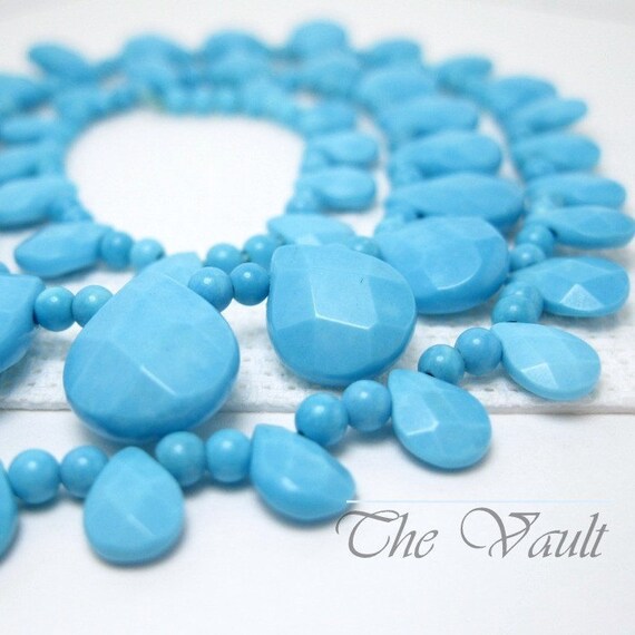 Strand  Turquoise 7-12mm graduated briolette and bead strand