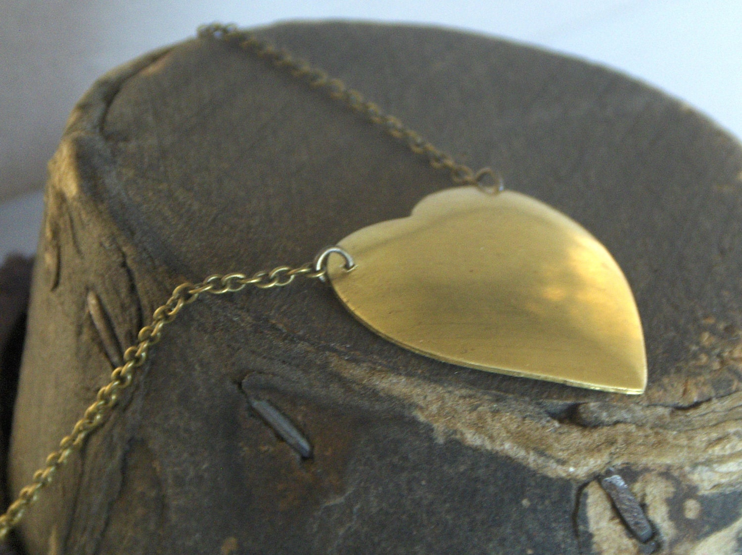swollen heart. Vintage brushed patina brass heart necklace -