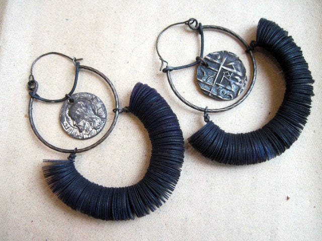 El Silbo. Rustic gypsy hoops with tribal and religious medals.