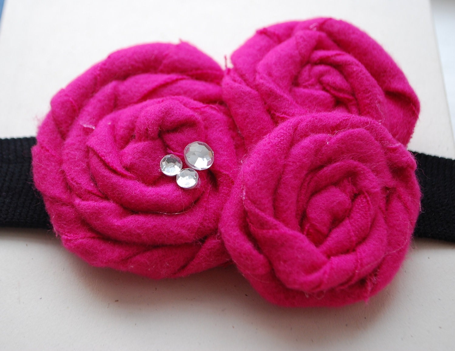 Rosette Fabric Trio Headband Shown in Bright Pink with Rhinestones and Red with White Sparkles