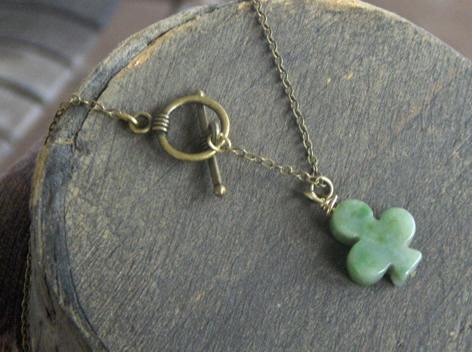 As Luck would have it.  Green Jade 3 leaf lucky Irish Clover Unisex necklace.