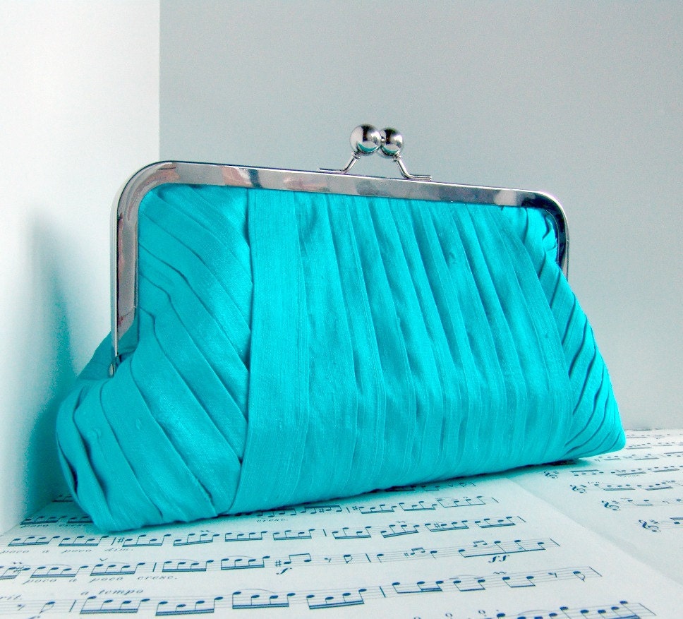 Silk turquoise blue pleated clutch in frame with chain, Spring fashion