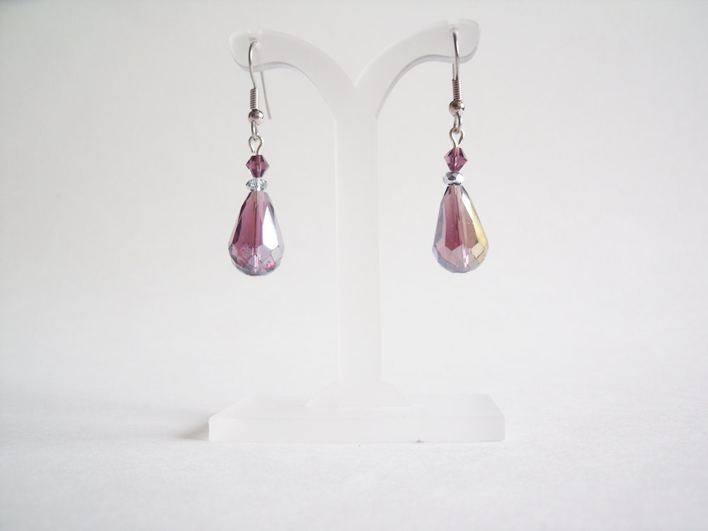 These 2 purple crystal bridal drop earrings feature purple and silver 