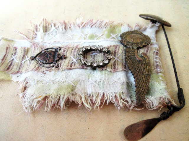 Poverty. Textile and Antiques Rustic Victorian Gypsy Assemblage Brooch. Lace fabric and rhinestones.