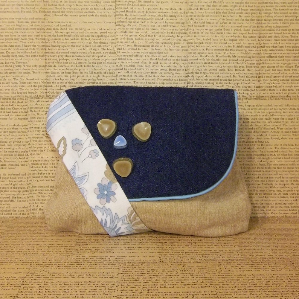 Denim and caramel retro sling bag.