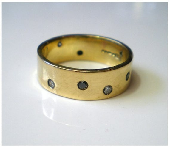 Night and Day wedding ring 18 Karat yellow gold band by kalicat from etsy 