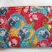 Macaw Head Zipper Pouch with Red Lining by BagsOfaFeather on Etsy