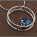 Floating blue Topaz sterling silver Round pendant