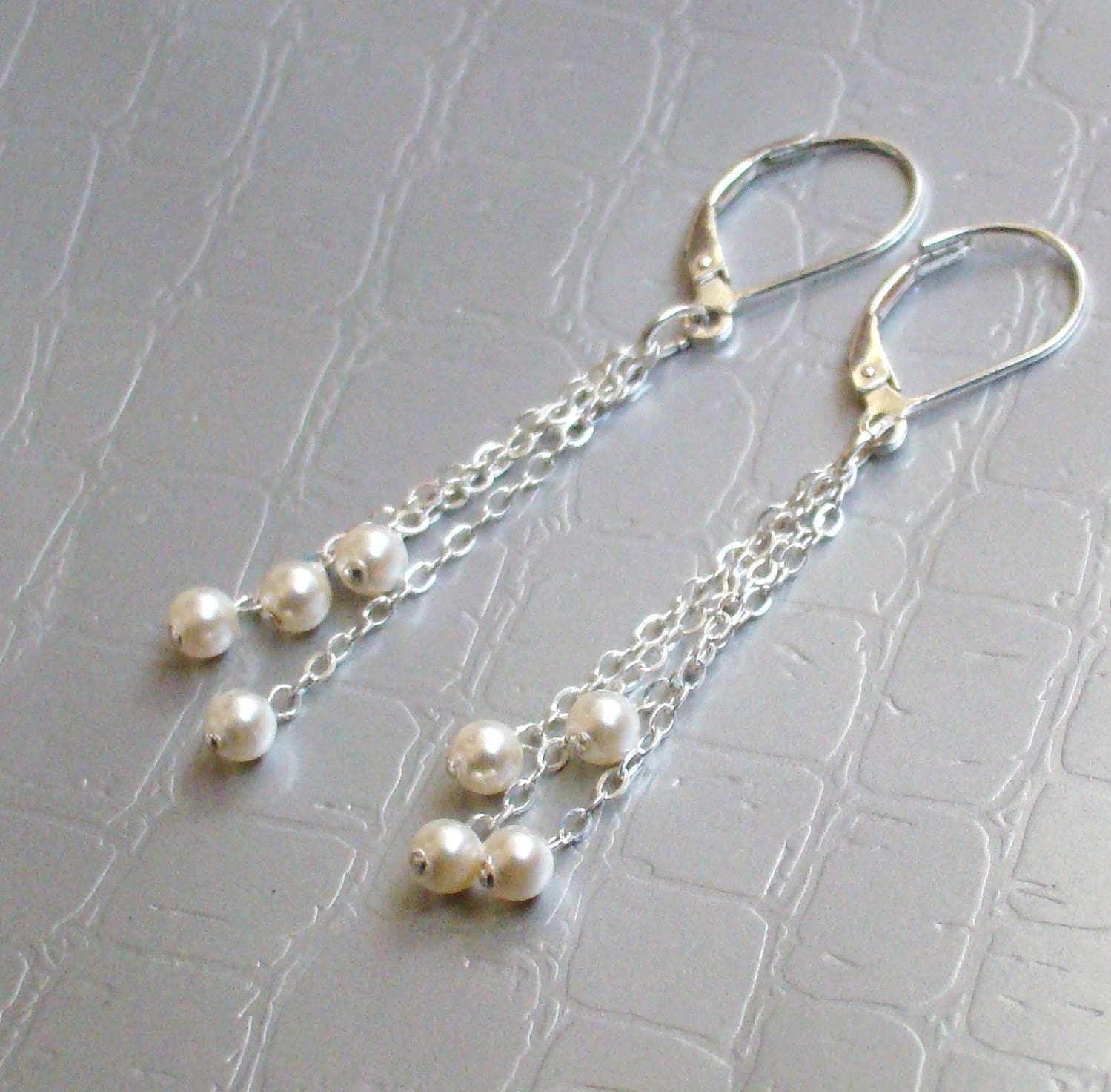 White Pearls Silver Tassel Earrings