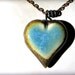 Burned Blue. Heart-shaped pendant necklace