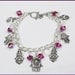 Silver Charm Bracelet With an Array of Pewter by anjalicreations