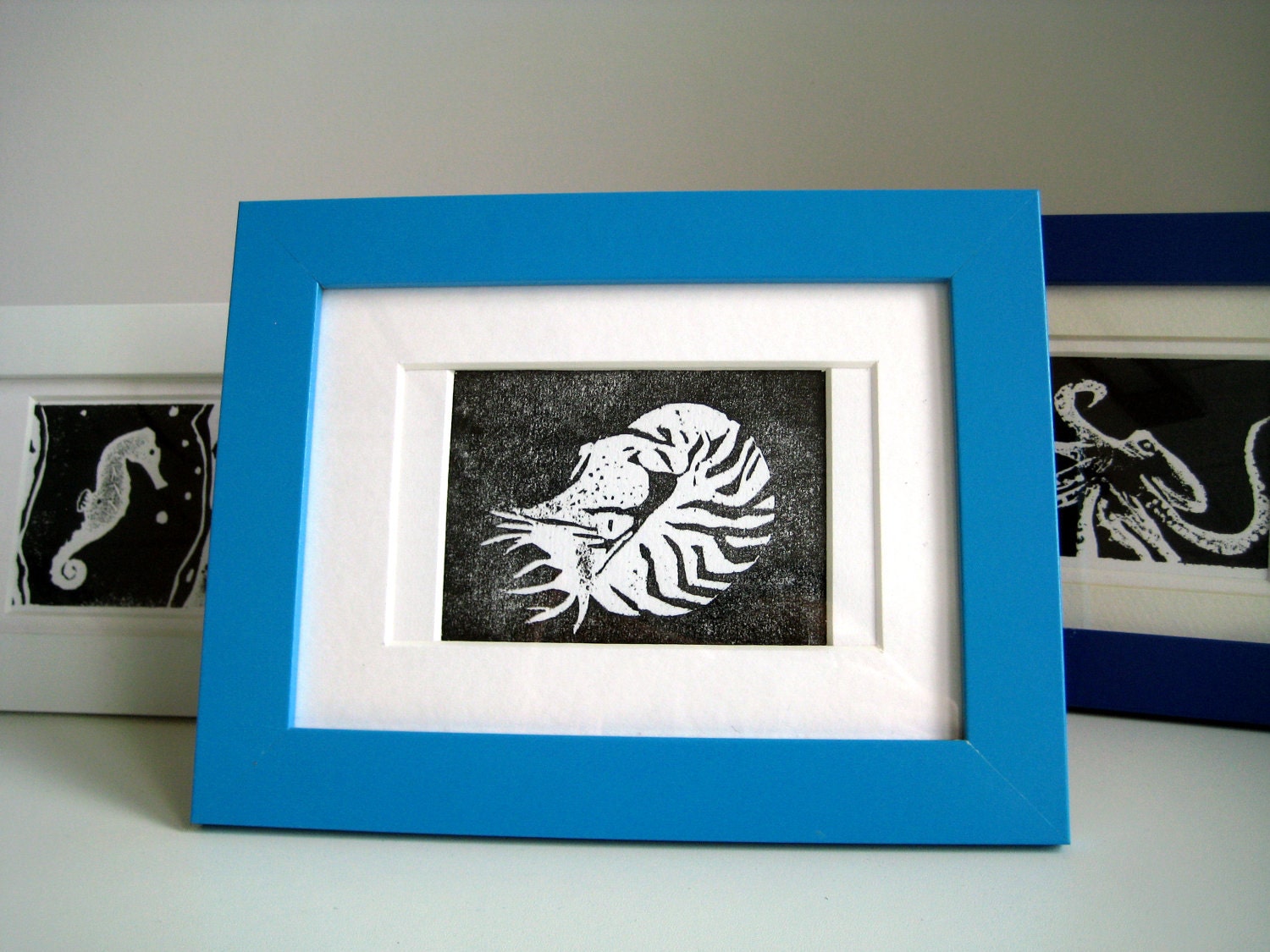 Nautilus - Mounted Linocut in Blue Frame