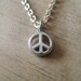 PeaceLoveEarth Recycled Sterling Silver Peace Charm Necklace w/ Peace Wax Sealed Box Recycled Box & Organic Cotton Pouch