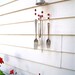 WIND CHIME Wind Chime made with REcYcLed  SILVERWARE and ReD and wHiTe gLass BeaDs and a  vinTage quarTer cup Measuring CuP