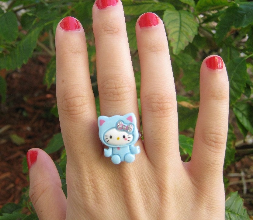 Cute and Tiny Hello Kitty Ring in Blue with a by PinkFrog4U from etsy.com
