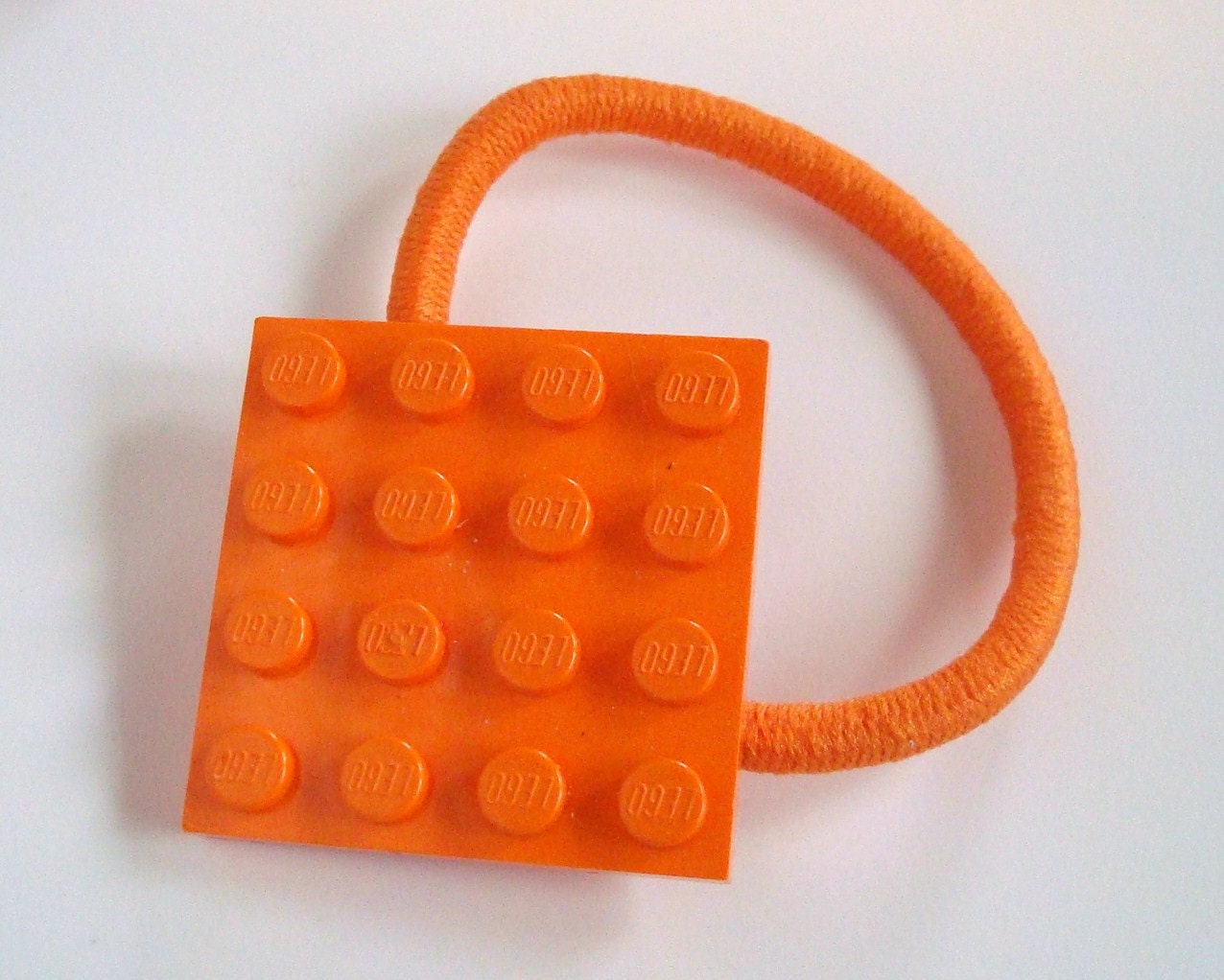 Pony Tail holder made with Lego (r) plate Orange