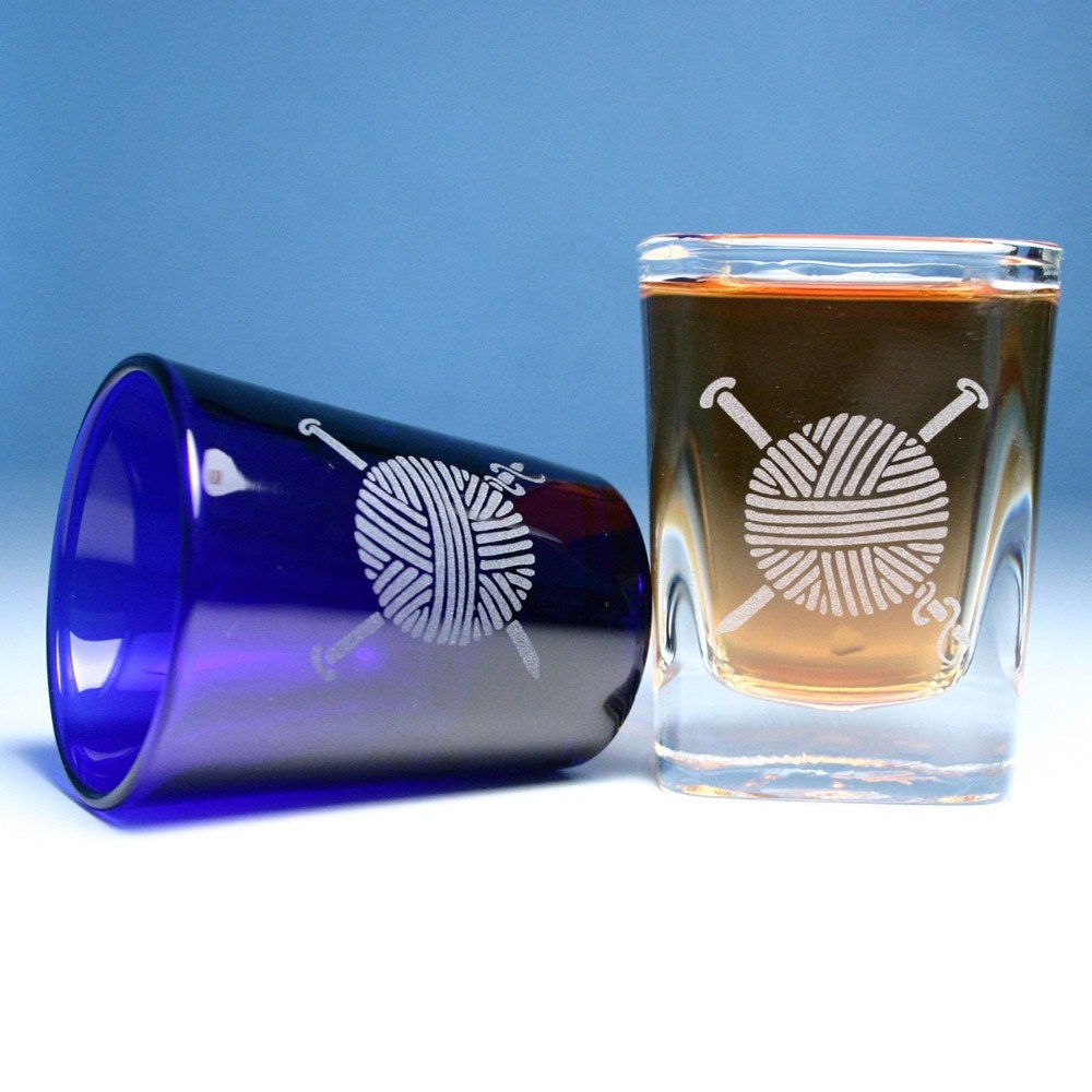 2 Shot Glasses - Yarn - round blue and clear square etched glasses