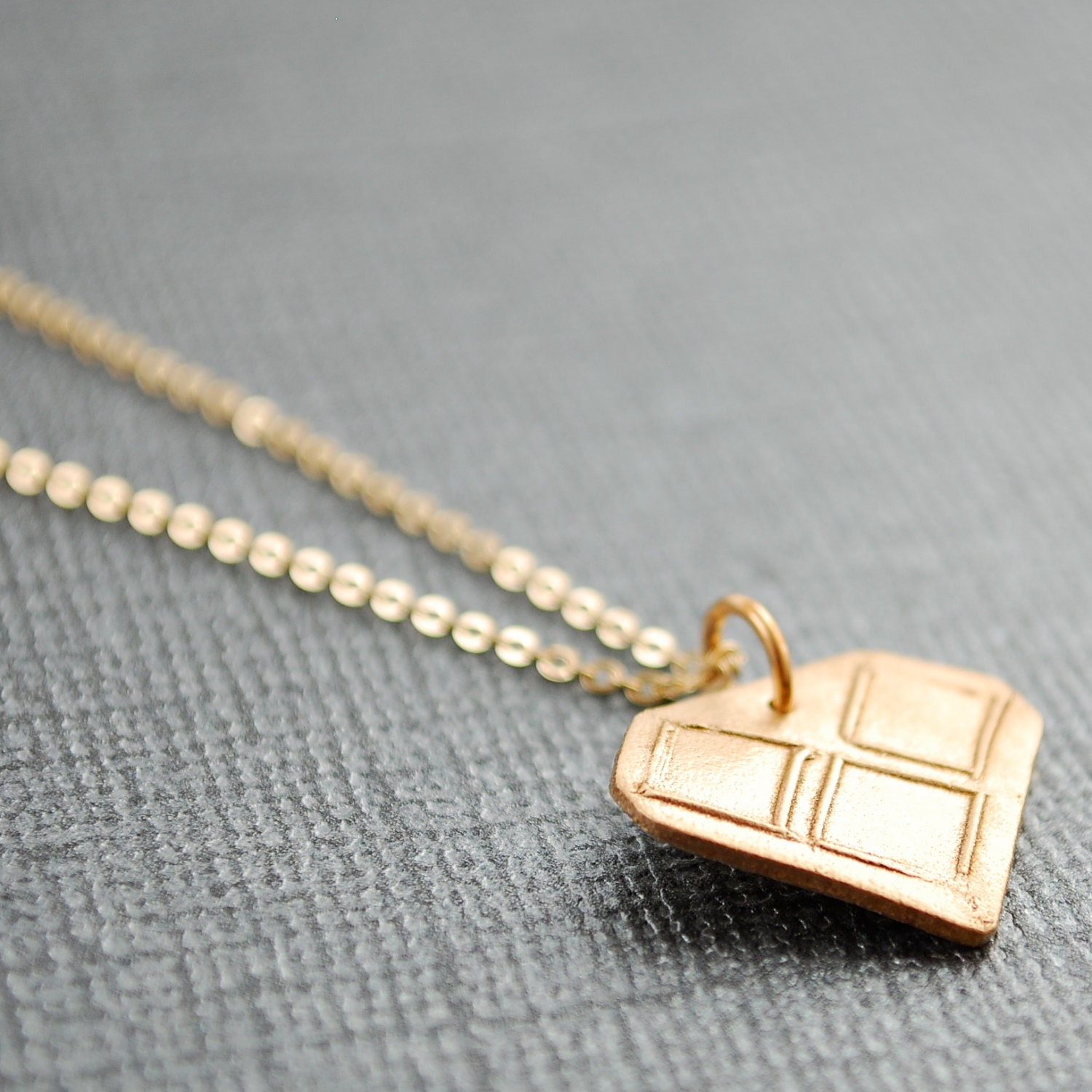 Gold GEOMETRIC heart necklace, eco-friendly bronze necklace handcrafted by Chocolate and Steel