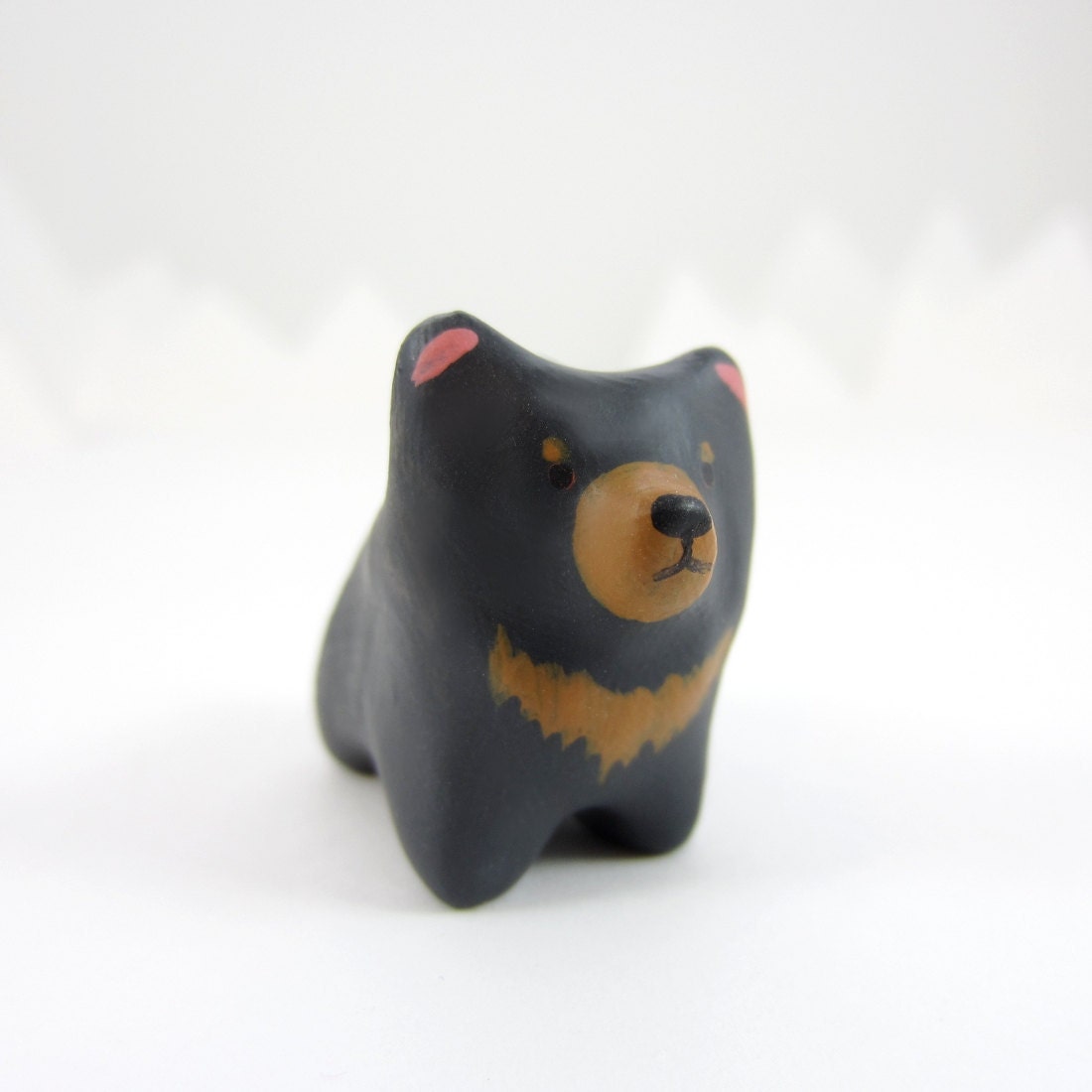 sun bear pocket totem figurine