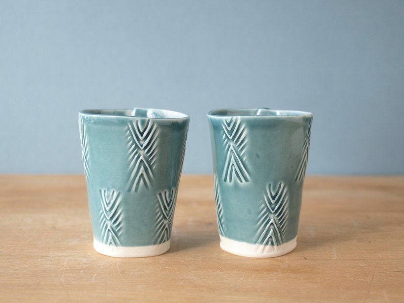 textured porcelain shot glass pair.