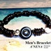 Mens Bracelet   "Prestige " focal point of Black Resin with a lBlack Pearl in the center,  Seashell, Hematite, Paua,Seed beads And Silver