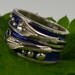 Sterling Silver Ring with Lily Design and Royal Blue Enamel.