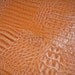 Faux Alligator Embossed Leather Fabric in Orange -- EK-QS38278