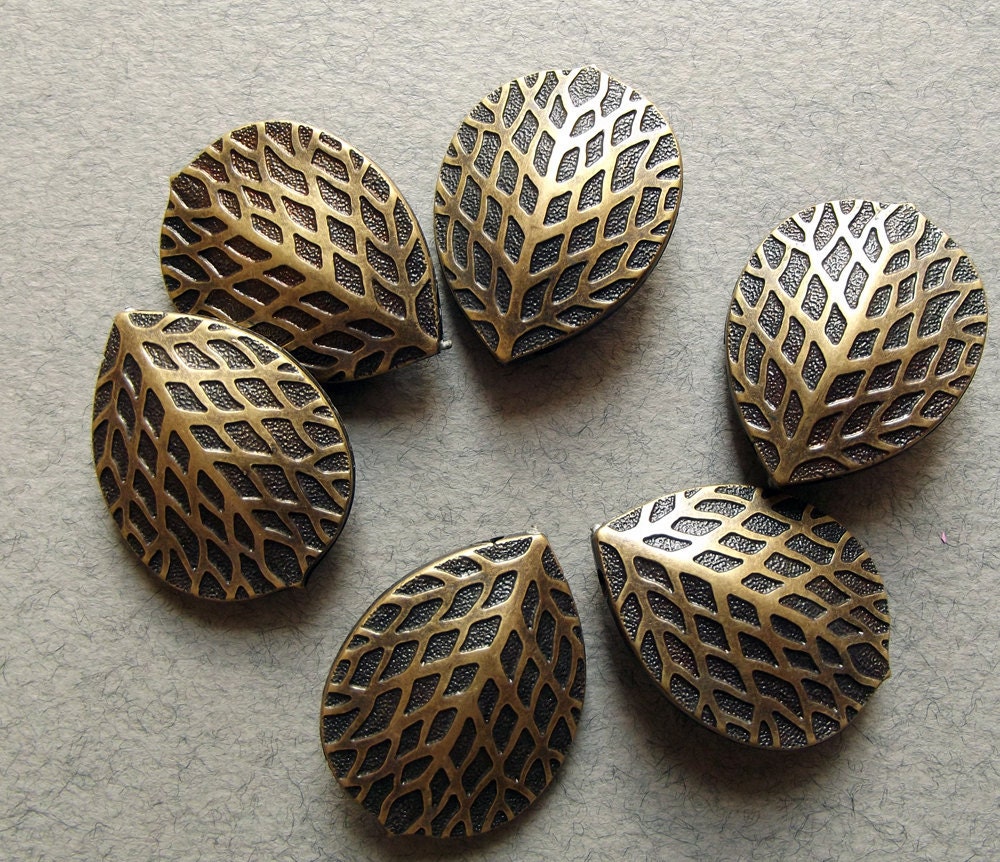 Vintage large antiqued gold leaf beads