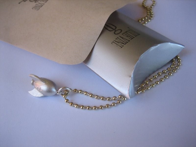 Sterling silver rocket locket, rubber seal