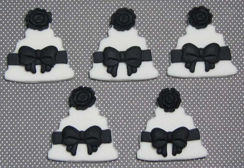 This listing is for 12 Wedding cake black and white cupcake toppers made out 