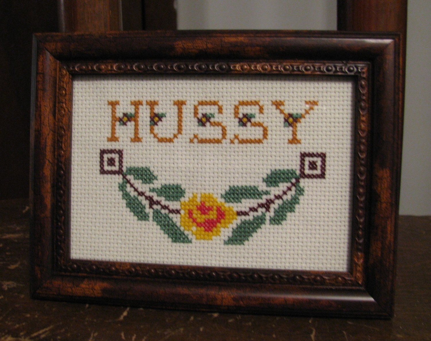 Hussy Cross-Stitch