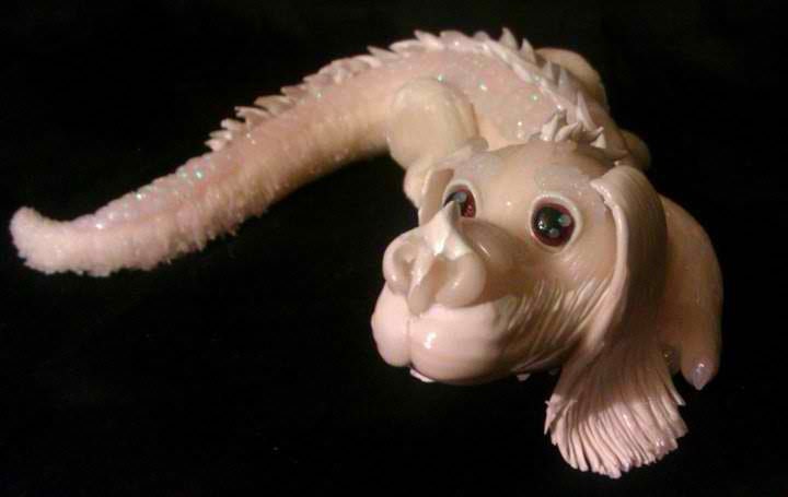 Falcor is forever with this sweet mixed ceramic work of art by Chastine.