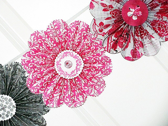 garland paper flowers pink grey wedding wall decor photo shoot