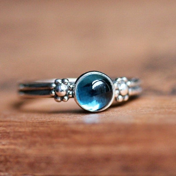 Silver daisy ring in Blue topaz-blue topaz cabochon, daisy, silver ring, recycled sterling silver, hippie, boho