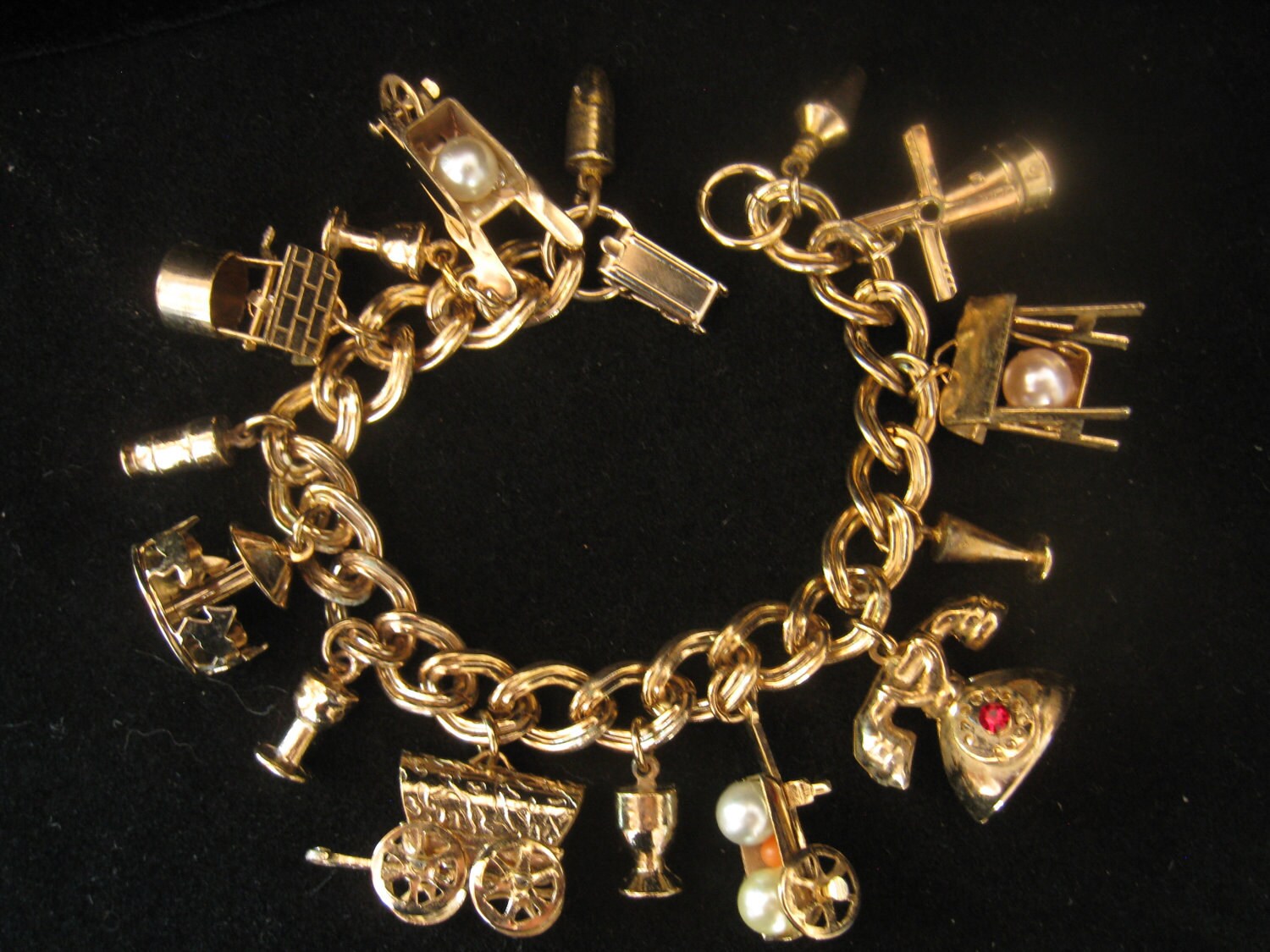 Love old charm bracelets! Charm bracelet, Vintage charm bracelet