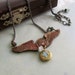 Winged Victory Steampunk locket necklace