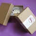 100 medium Kraft cotton filled boxes