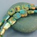 Gemstone beads: aqua terra jasper squares 12mm 7 inch strand