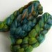 Lagoon -- dizzed roving (3.3 oz) merino, bamboo, baby suri alpaca, sparkle.