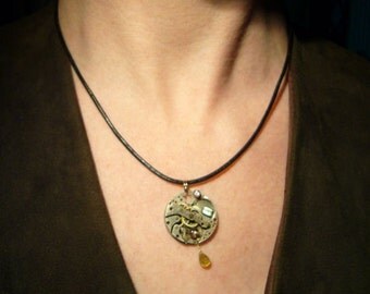 Steampunk pendant -- real gemstones & pocket watch works